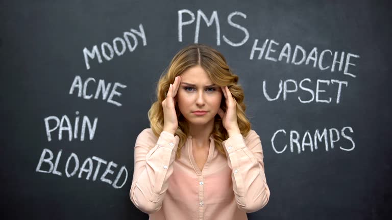 Woman suffering headache due to imaginary problems in pms, hormone imbalance